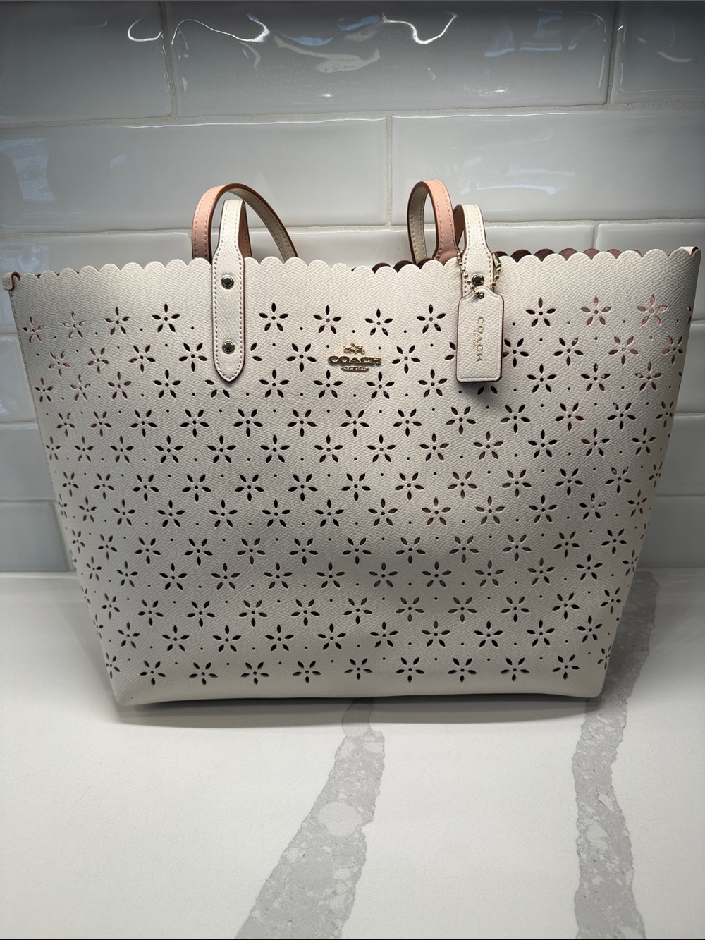 Coach Sparkly Light Pink Perforated Floral Tote